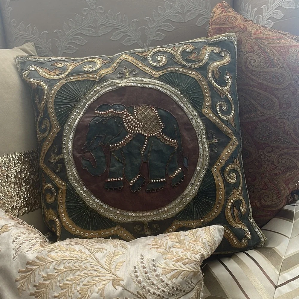 Elephant lovers this pillow is lovely exotic and quite intricate black silk back
